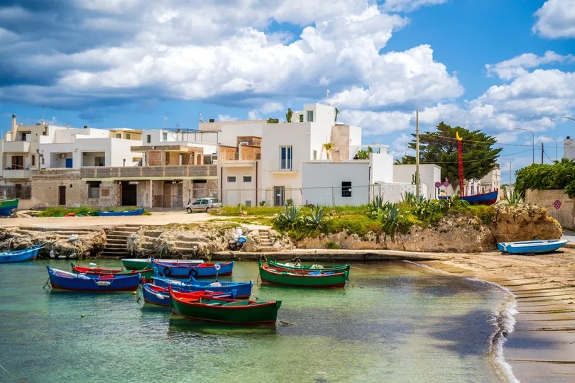 Familievakantie Sardinië, bootjes bij San Vito.